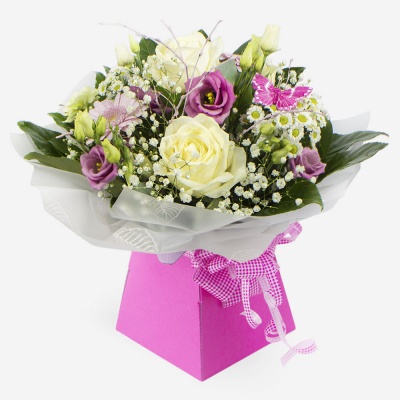 Penelope - A petite hand tied of pastel flowers makes a lovely gift for any occasion.